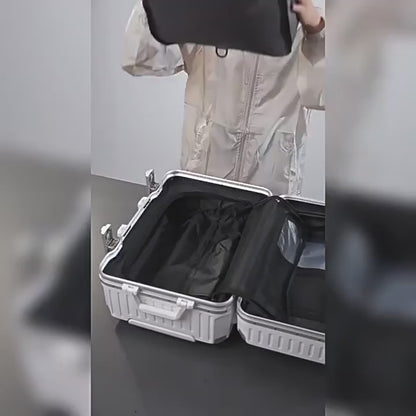 Aervira compression bag being packed into a carry-on suitcase