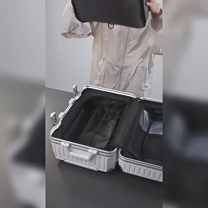 Aervira compression bag being packed into a carry-on suitcase